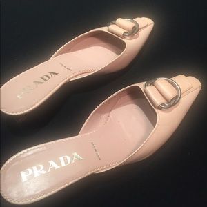 Prada kitten heel slides.